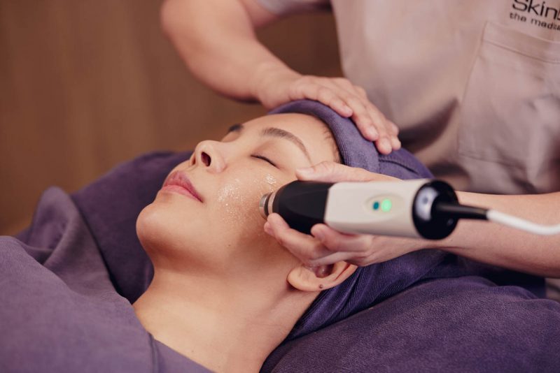 Ultrasound application during a brightening facial